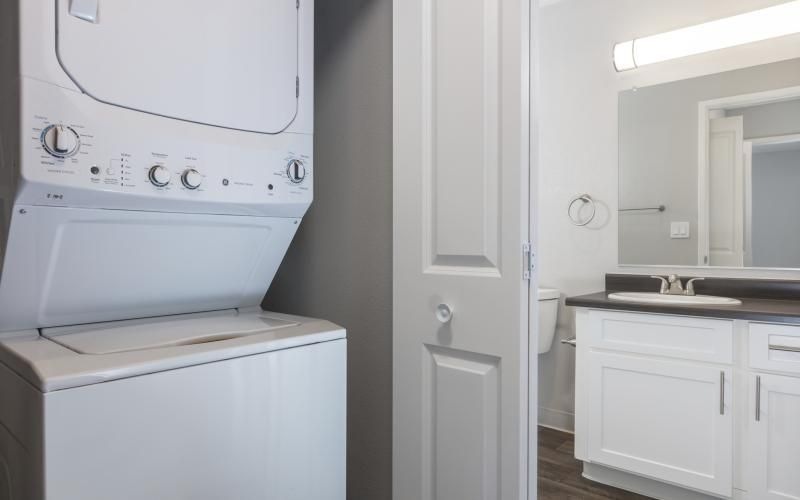 a laundry area with a washer and a dryer