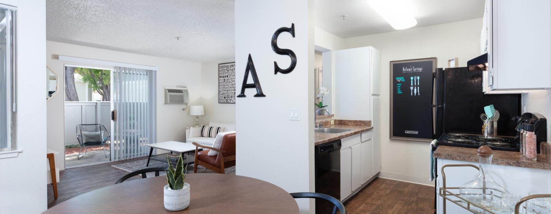 a kitchen with a dining table