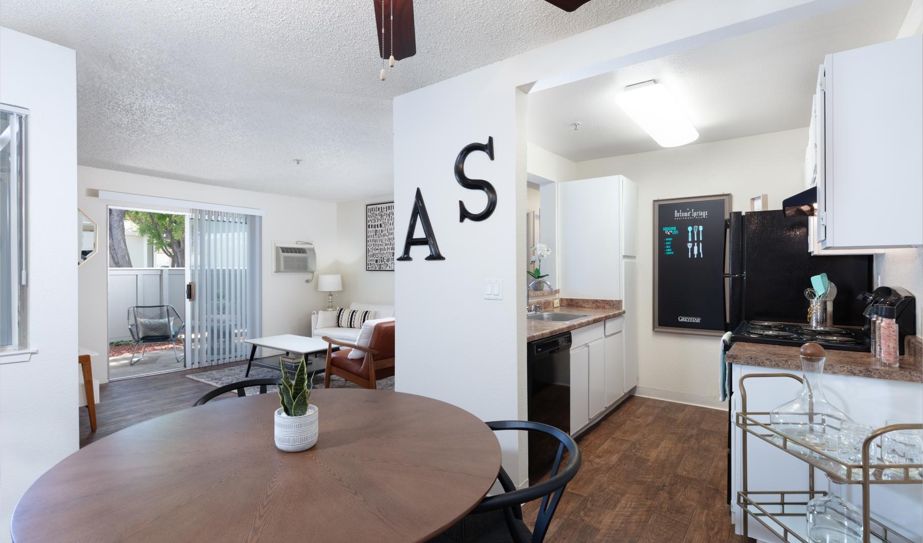 a kitchen with a dining table